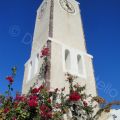 A Clock Tower In Santorini