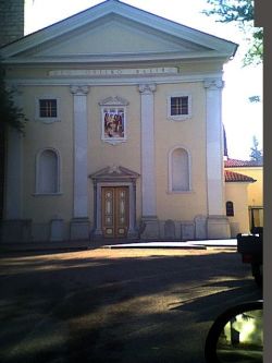 Facciata della chiesa di S. Lorenzo _ Affresco del Martirio di S. Lorenzo