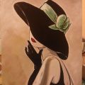 Donna con cappello e fiocco verde